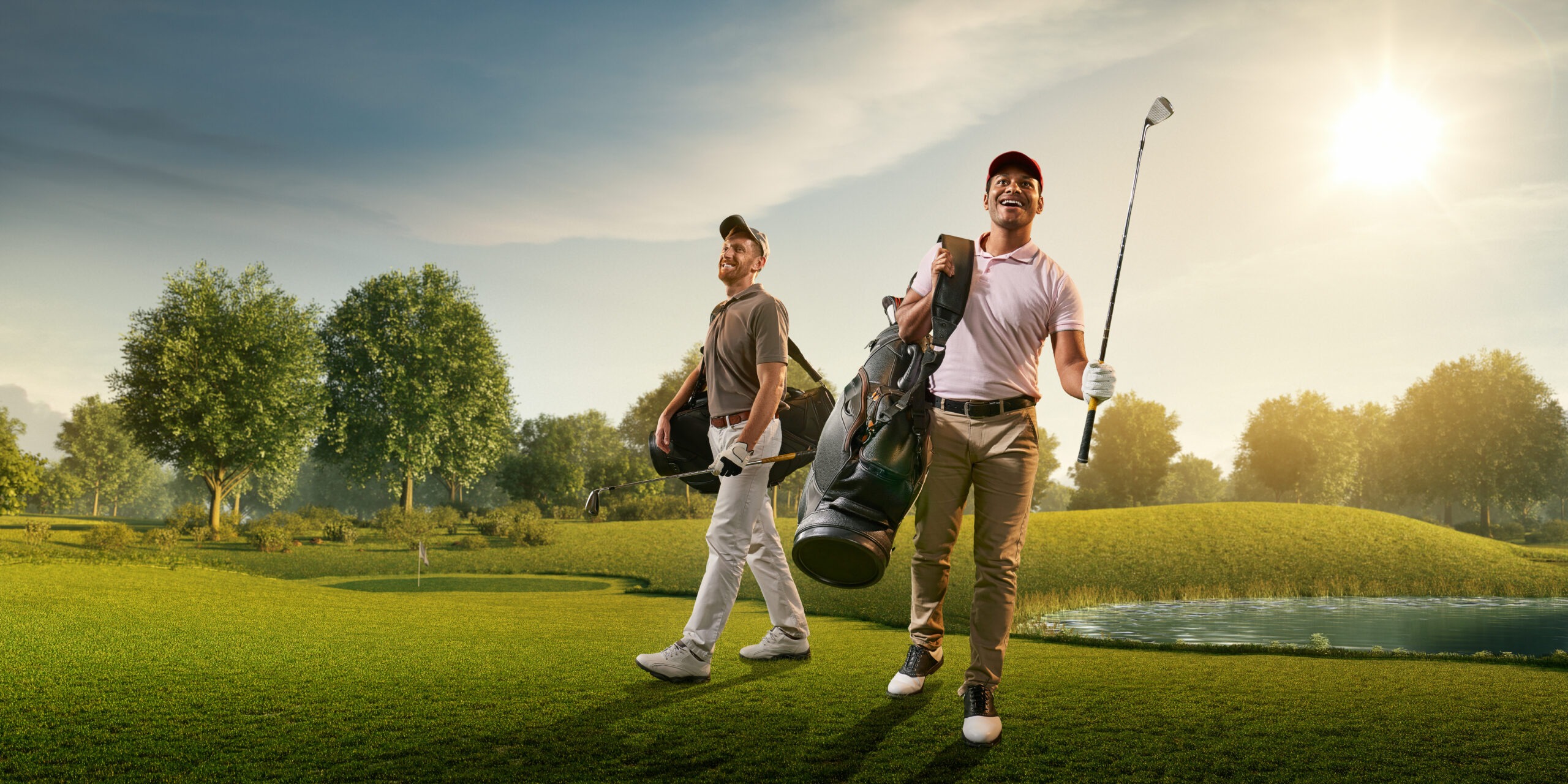 Two male golf players on professional golf course.